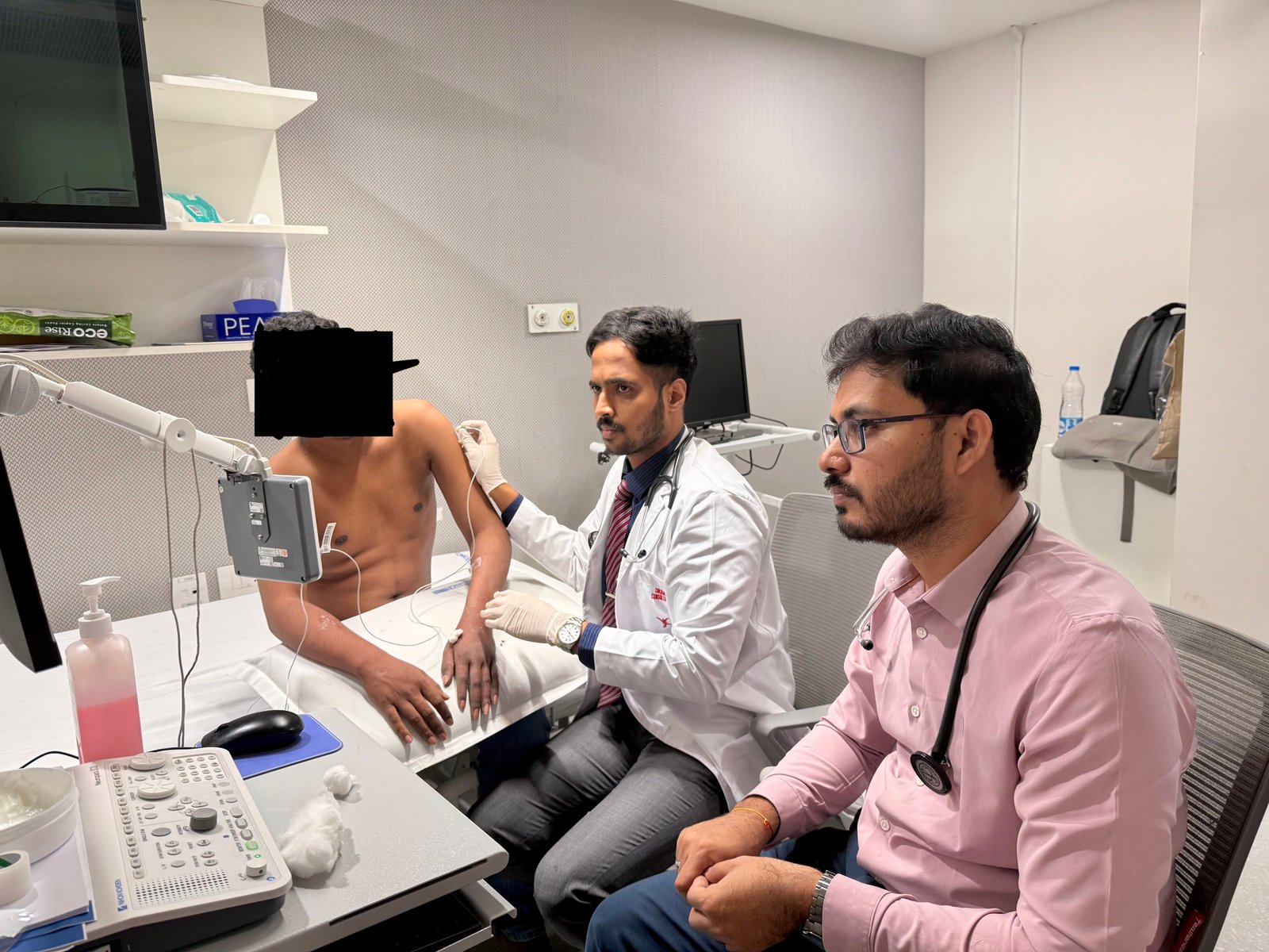 Dr. Rahul Gunde performing highly skilled EMG procedure with needle electrode placement for brachial plexopathy diagnosis